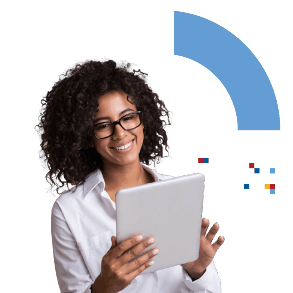 Smiling woman with curly hair and glasses wearing a white shirt, holding and looking at a tablet device.